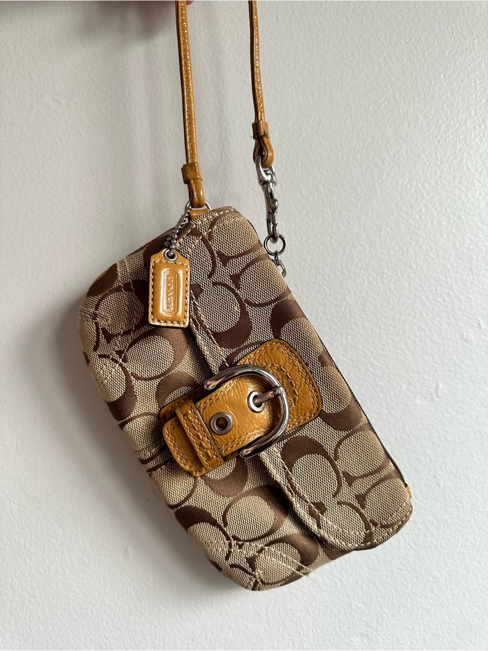 COACH signature brown wristlet with soho flap brown leather